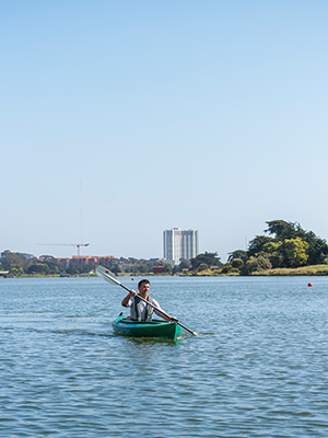 A man in a green hyak 