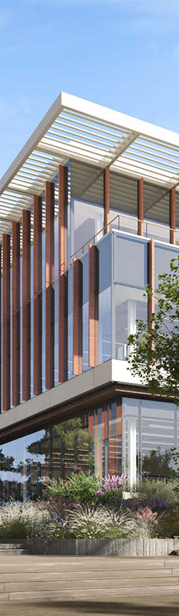Modern glass building with decorative orange facade